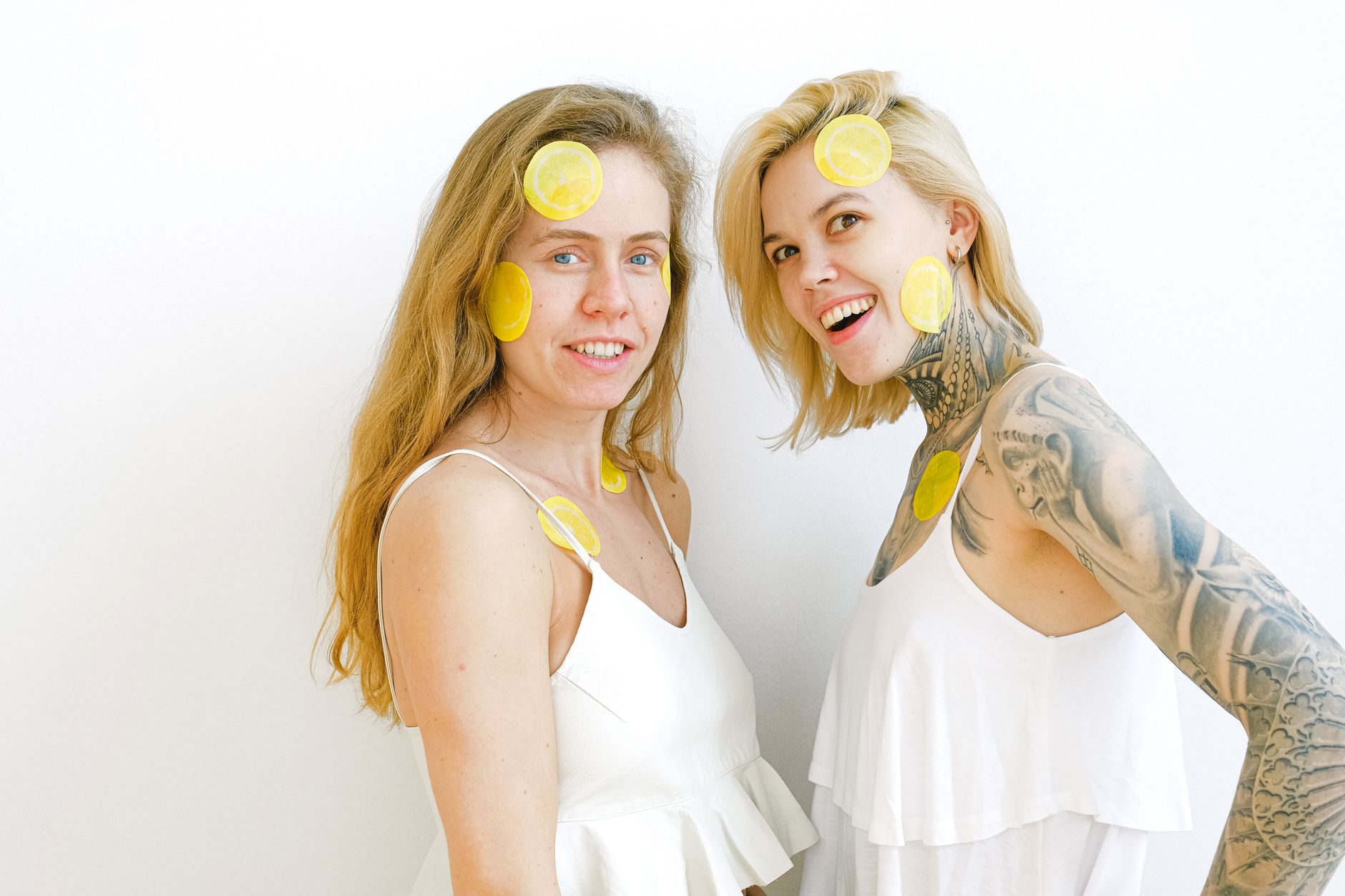 Two hands holding pastel-coloured silicone toys, representing openness and partnership